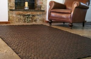 Upcycled Leather Rug by Elvis and Kresse