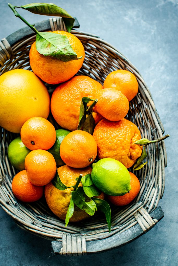 Basket of citrus fruits including oranges. Picture by Rawpixel