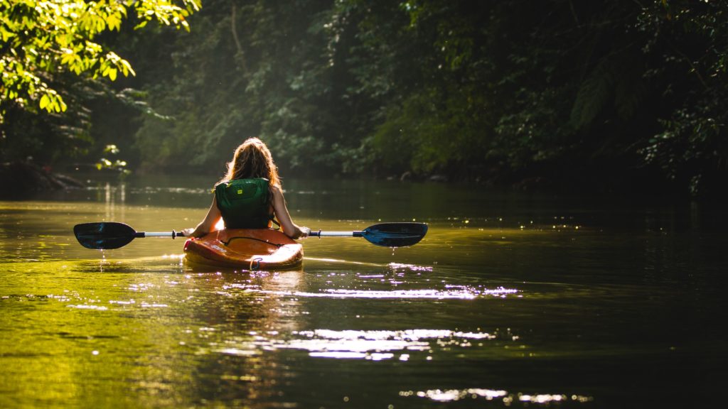 Girl in a canoe by Filip Mroz