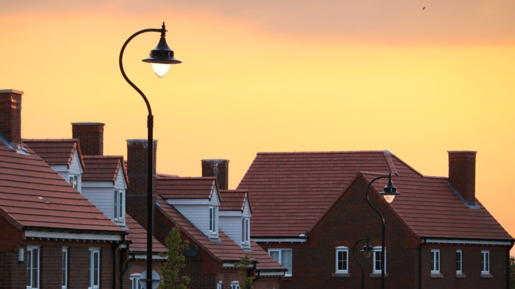 Rooftops at sunrise by Tom Thain